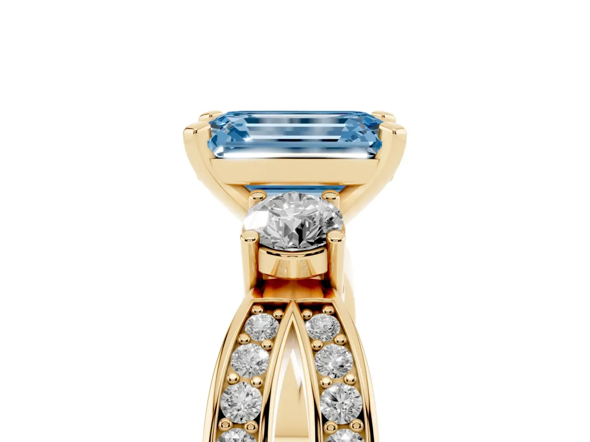 Fancy Blue Three-Stone Emerald Cut Cut Diamond Twist Band with Prong Setting Yellow gold