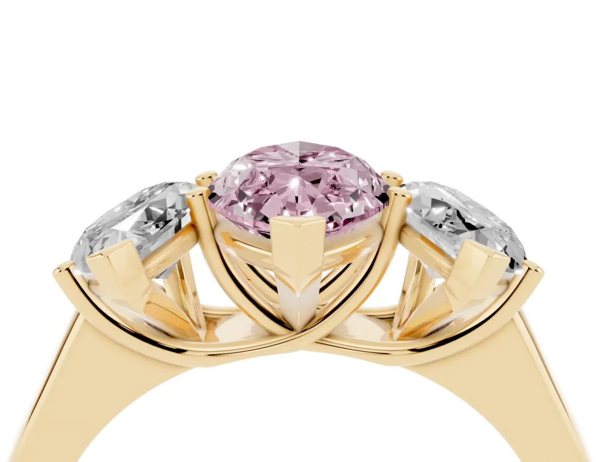 Fancy Pink Marquise Cut Three-Stone Diamond Ring with Prong Setting on a Classic Band Yellow gold