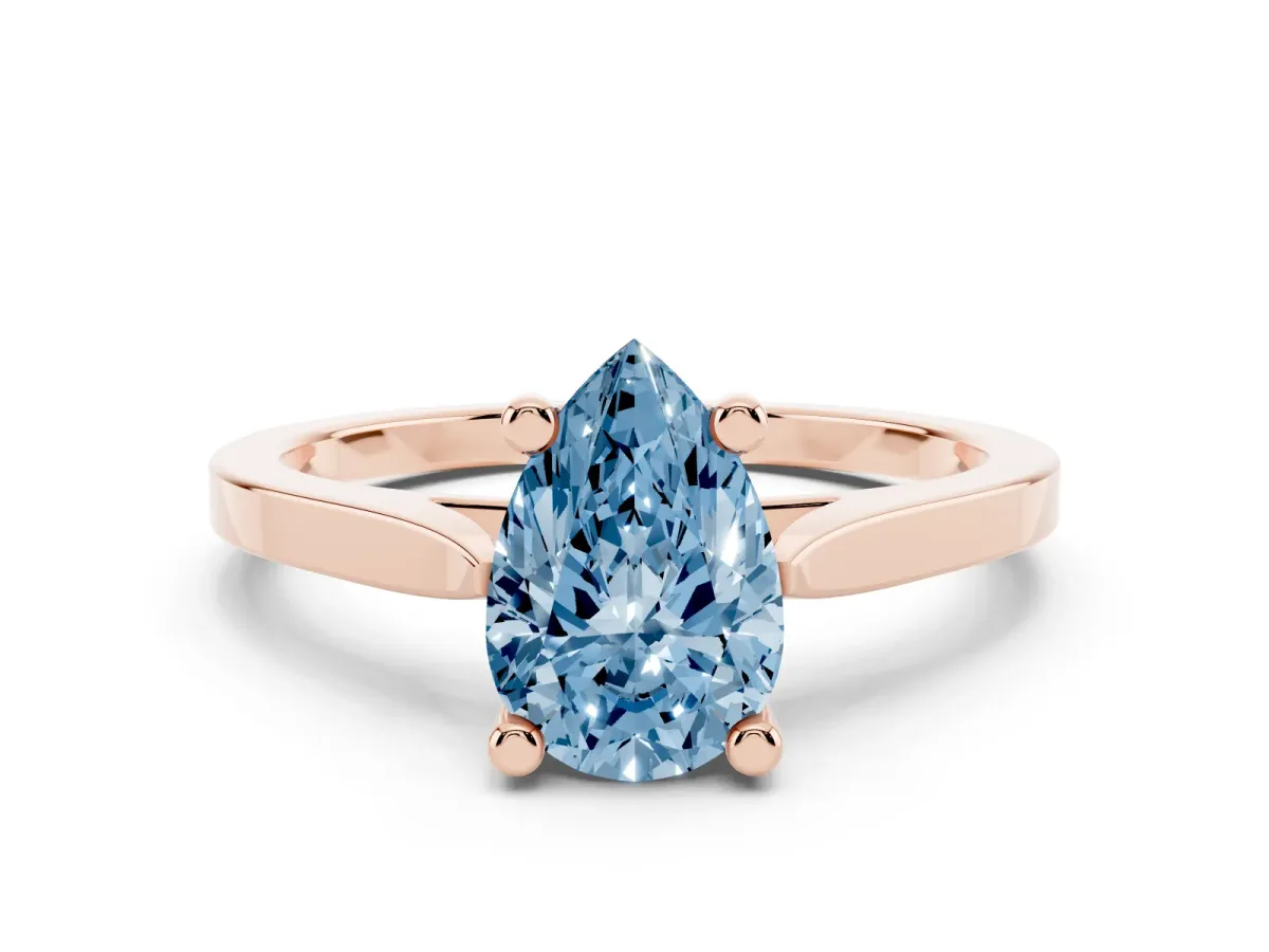 Fancy Blue Pear Cut Solitaire Diamond Ring with Four-Prong Setting and Tapered Band Rose gold
