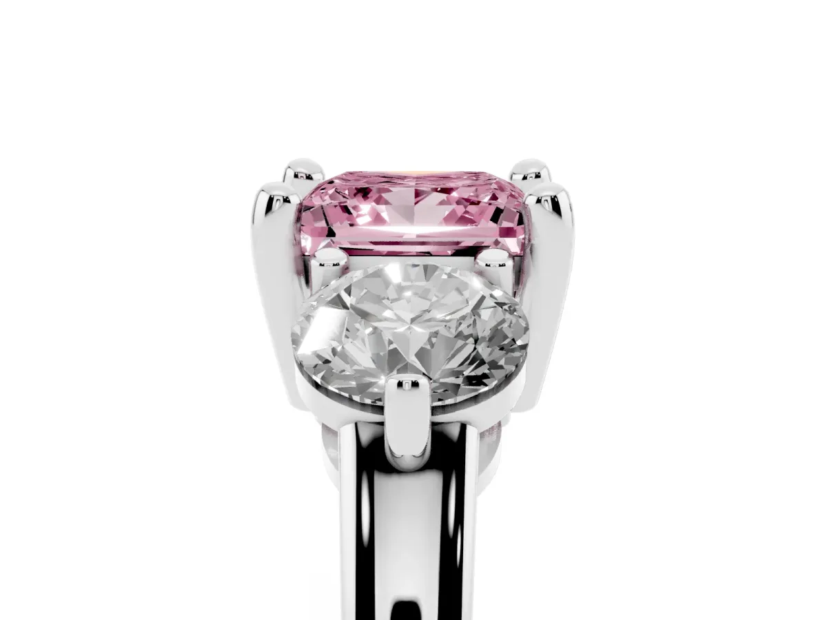 Fancy Pink Three-Stone Princess Cut Brilliant Cut Solitaire Ring with Prong Setting on a Classic Band Silver
