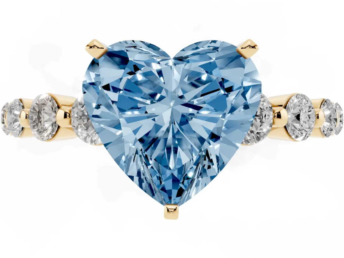 Fancy Blue Heart Cut Solitaire Diamond Ring with Pave Band and Four-Prong Setting Yellow gold