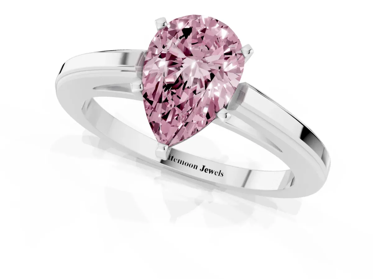 Fancy Pink Pear Cut Solitaire Diamond Ring with Four-Prong Setting and Classic Band Platinum