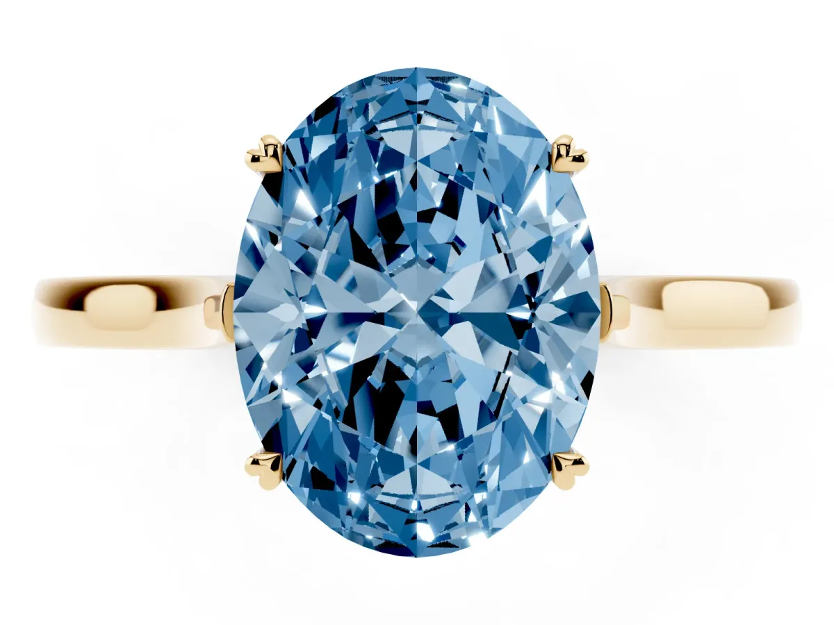 Fancy Blue Oval Cut Solitaire Heart Prong Engagement Ring with Tapered Band Yellow gold