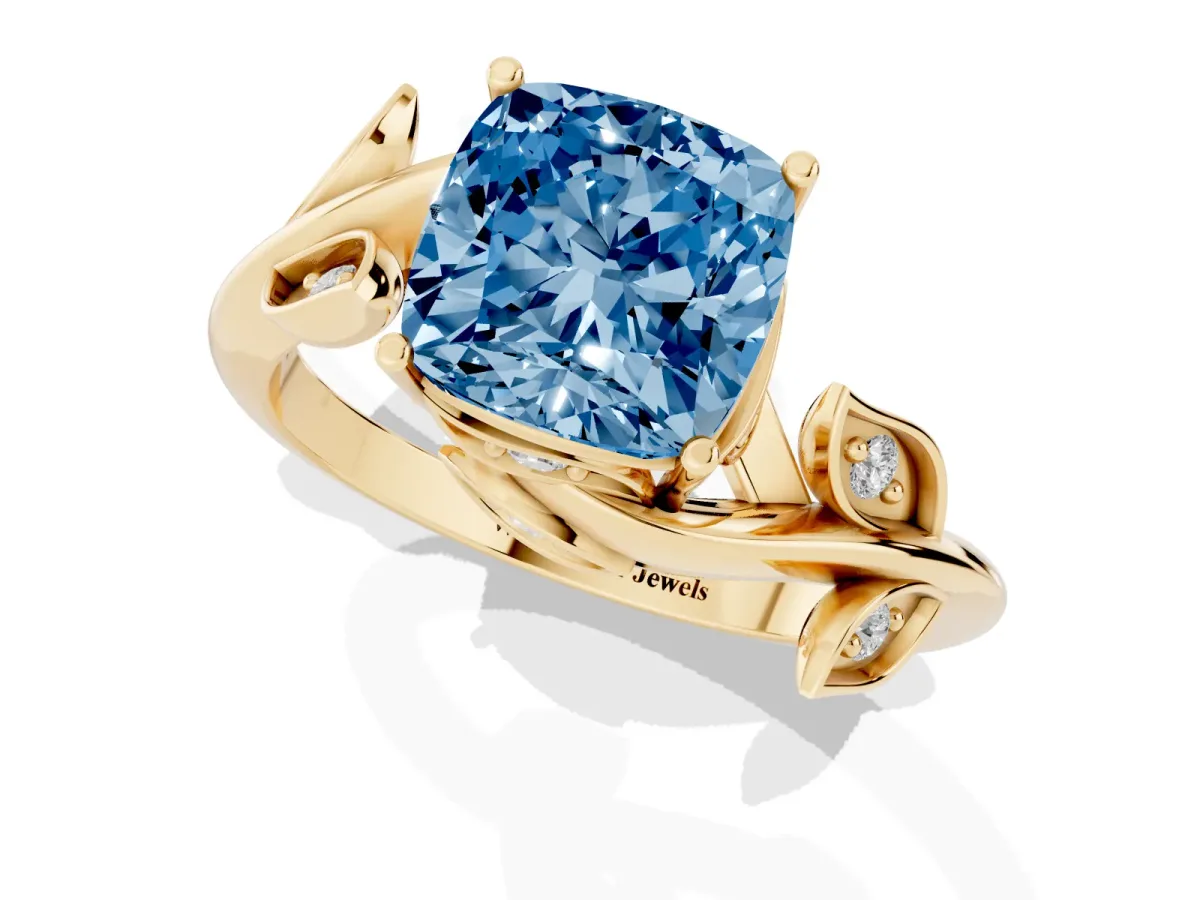 Fancy Blue Cushion Cut Solitaire Twist Engagement Ring with Leaf Accents and Prong Setting Yellow gold