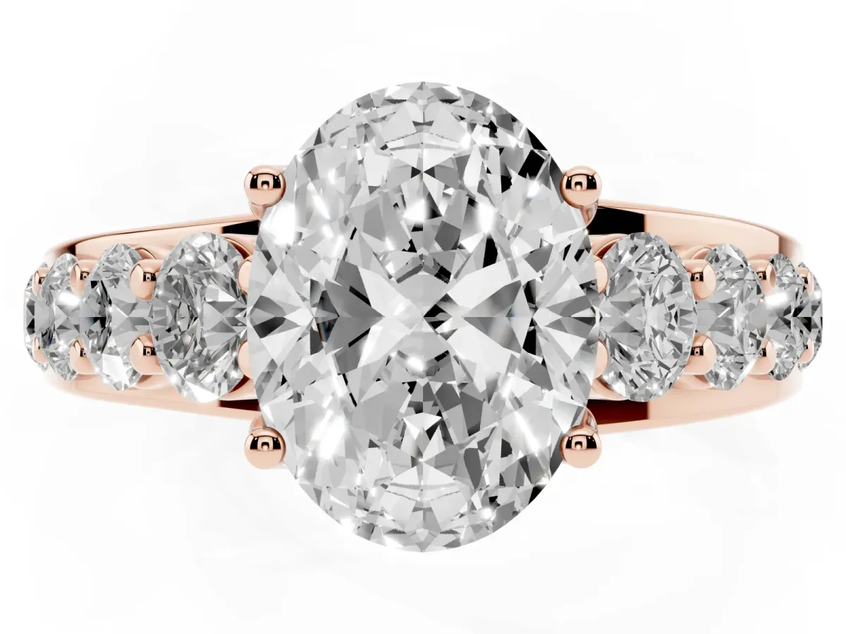 Oval Cut Diamond Engagement Ring with Pavé Band and Four-Prong Setting Rose gold