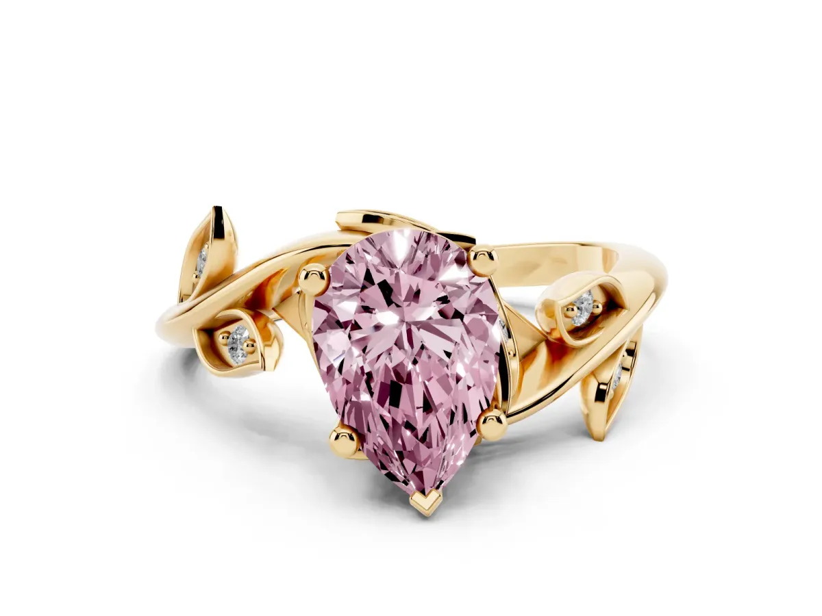 Fancy Pink Pear Cut Solitaire Twist Engagement Ring with Leaf Accents and Prong Setting Yellow gold