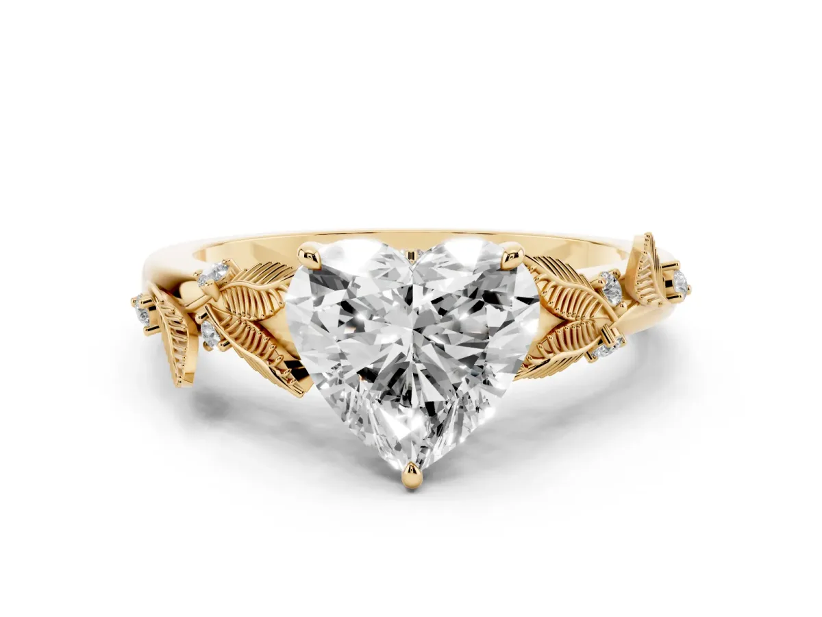 Heart Cut Diamond Solitaire Ring with Leaf Motif Band and Four-Prong Setting Yellow gold