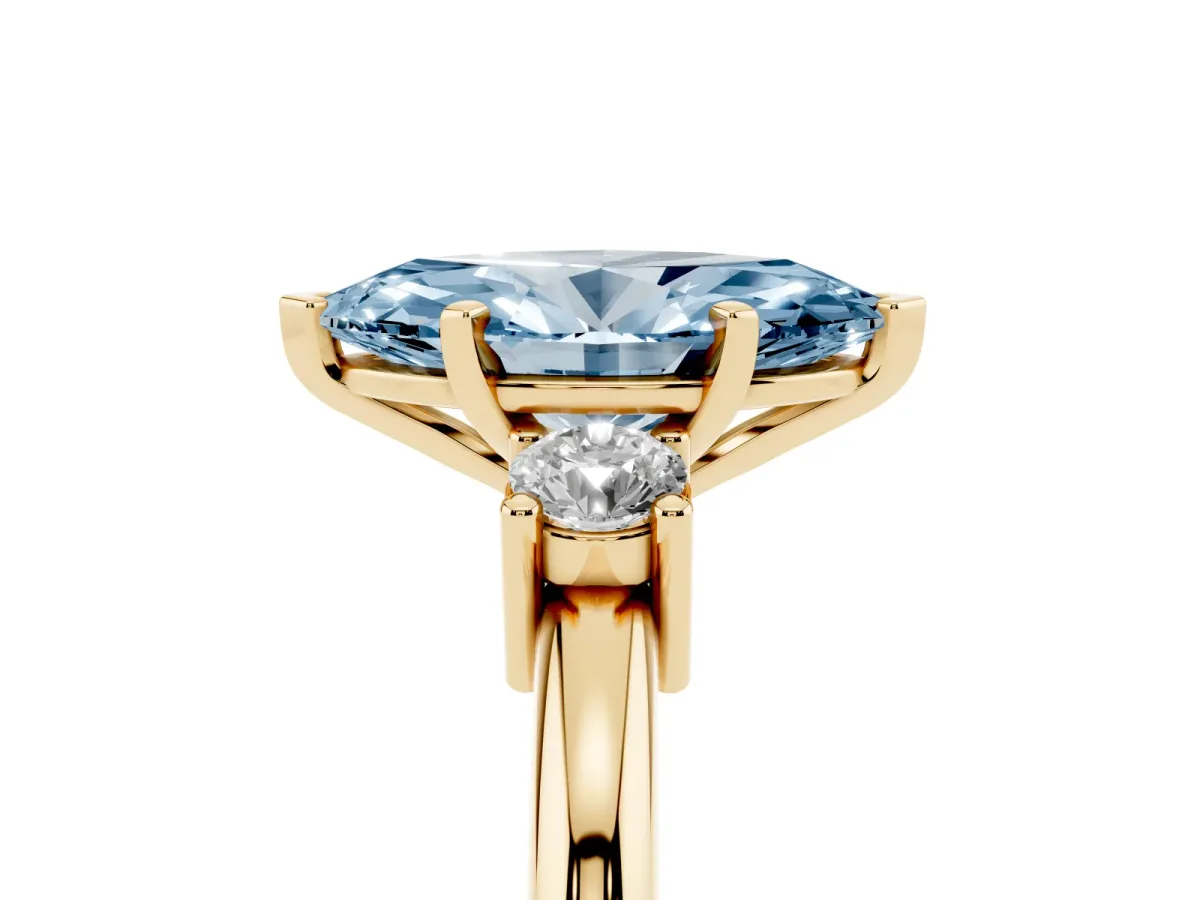 Fancy Blue Three-Stone Marquise Cut Cut Diamond Solitaire with Prong Setting and Classic Band Yellow gold