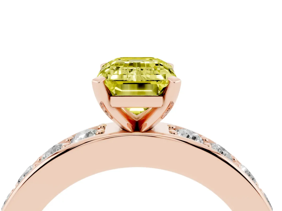 Fancy Yellow Emerald Cut Diamond Engagement Ring with Channel Set Round Band and Prong Setting Rose gold