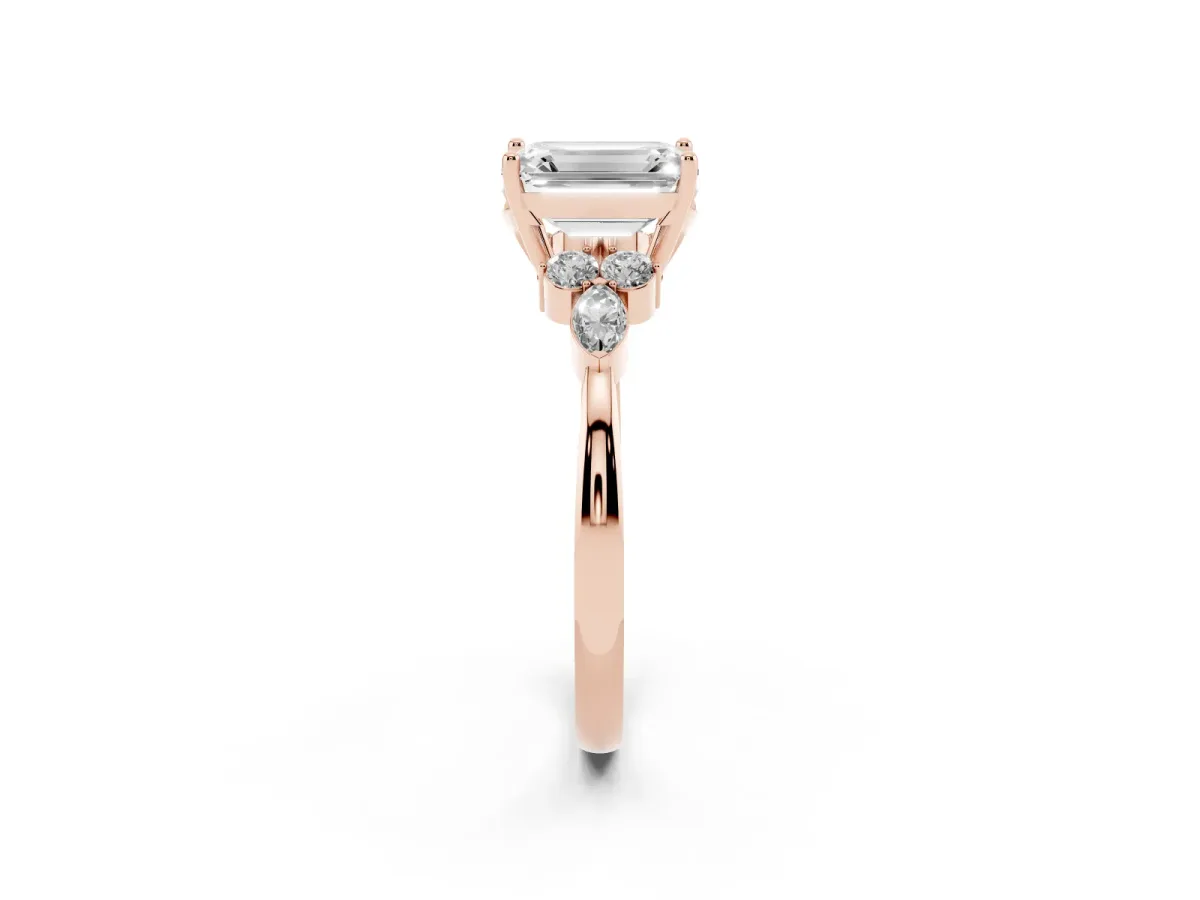 Emerald Cut Brilliant Diamond Solitaire Ring with Pear Side Stones and Four-Prong Setting Rose gold