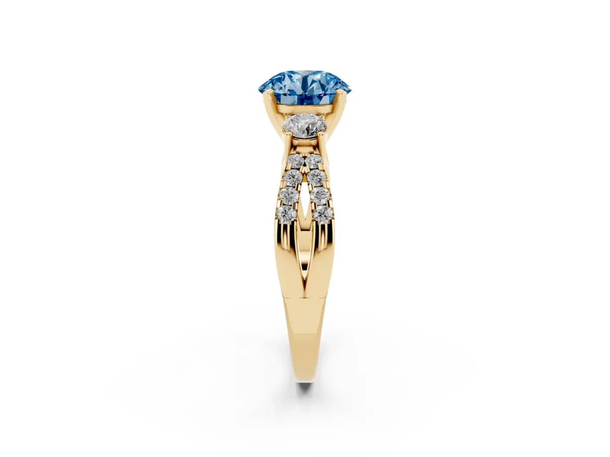 Fancy Blue Round Cut Diamond Three-Stone Ring with Pavé Split Shank and Four-Prong Setting Yellow gold
