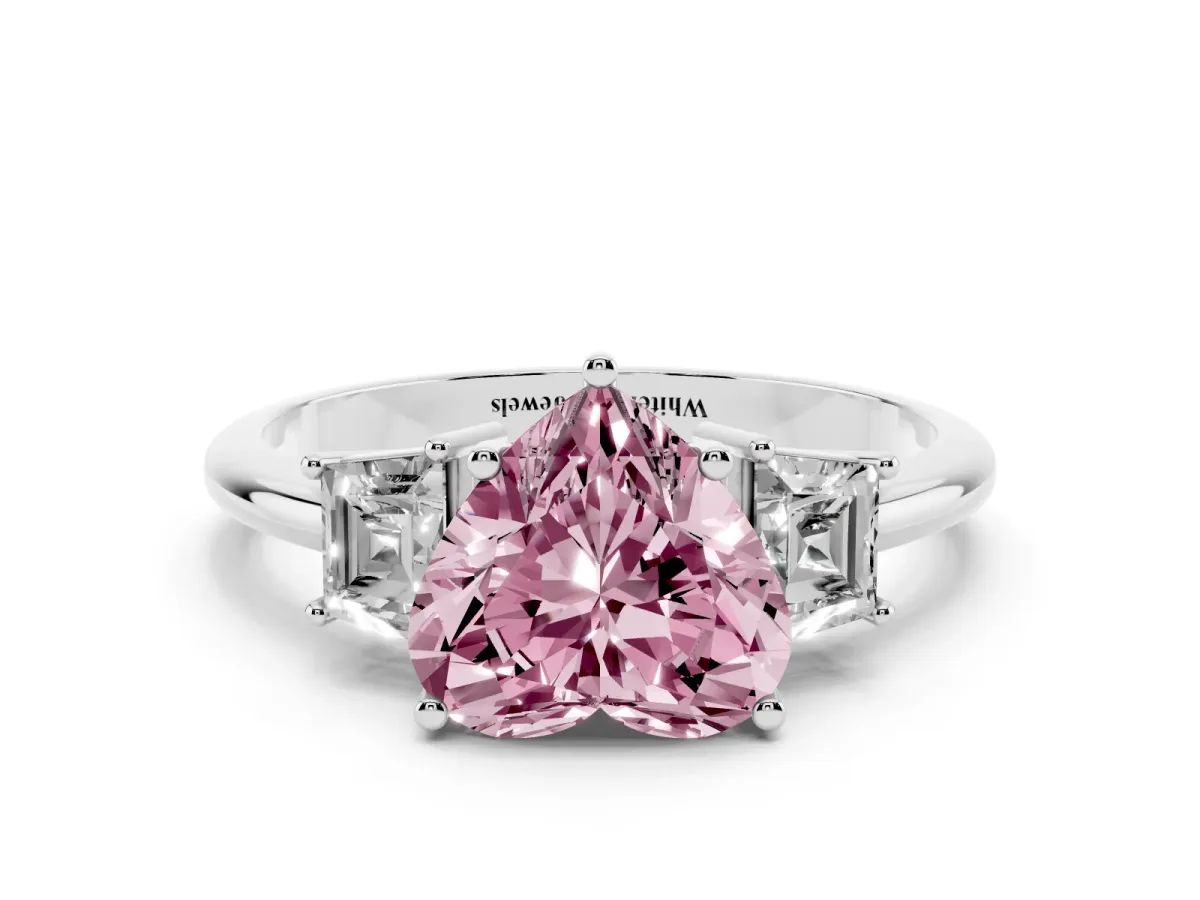 Fancy Pink Heart Cut Diamond Three-Stone Ring with Trapezoid Side Stones and Prong Setting Silver