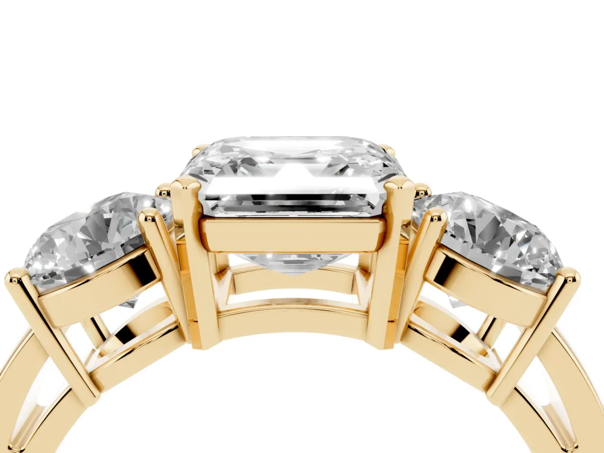 Three-Stone Asscher Cut Diamond Ring with Round Side Stones, Classic Band, and Four-Prong Setting Yellow gold