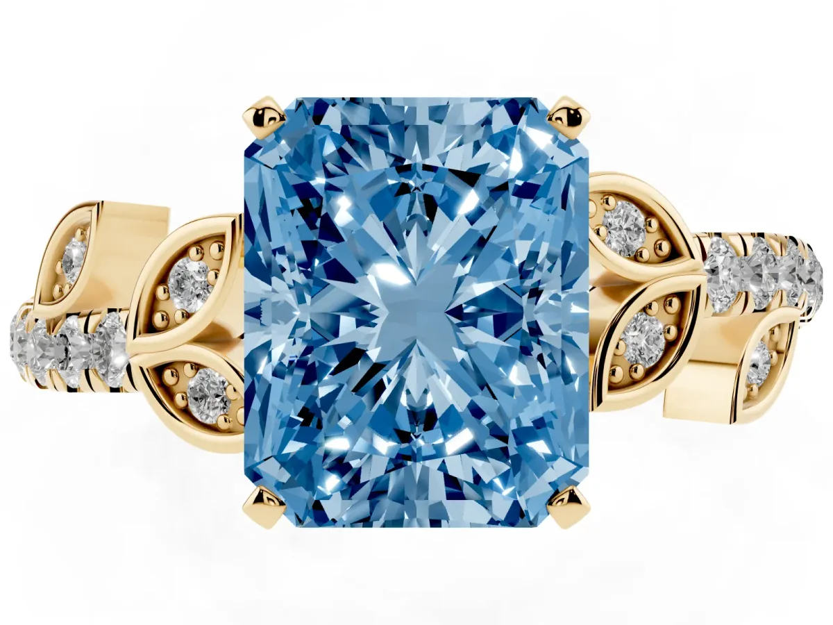 Fancy Blue Radiant Cut Solitaire Leaf-Inspired Diamond Ring with Pavé Band and Four-Prong Setting Yellow gold