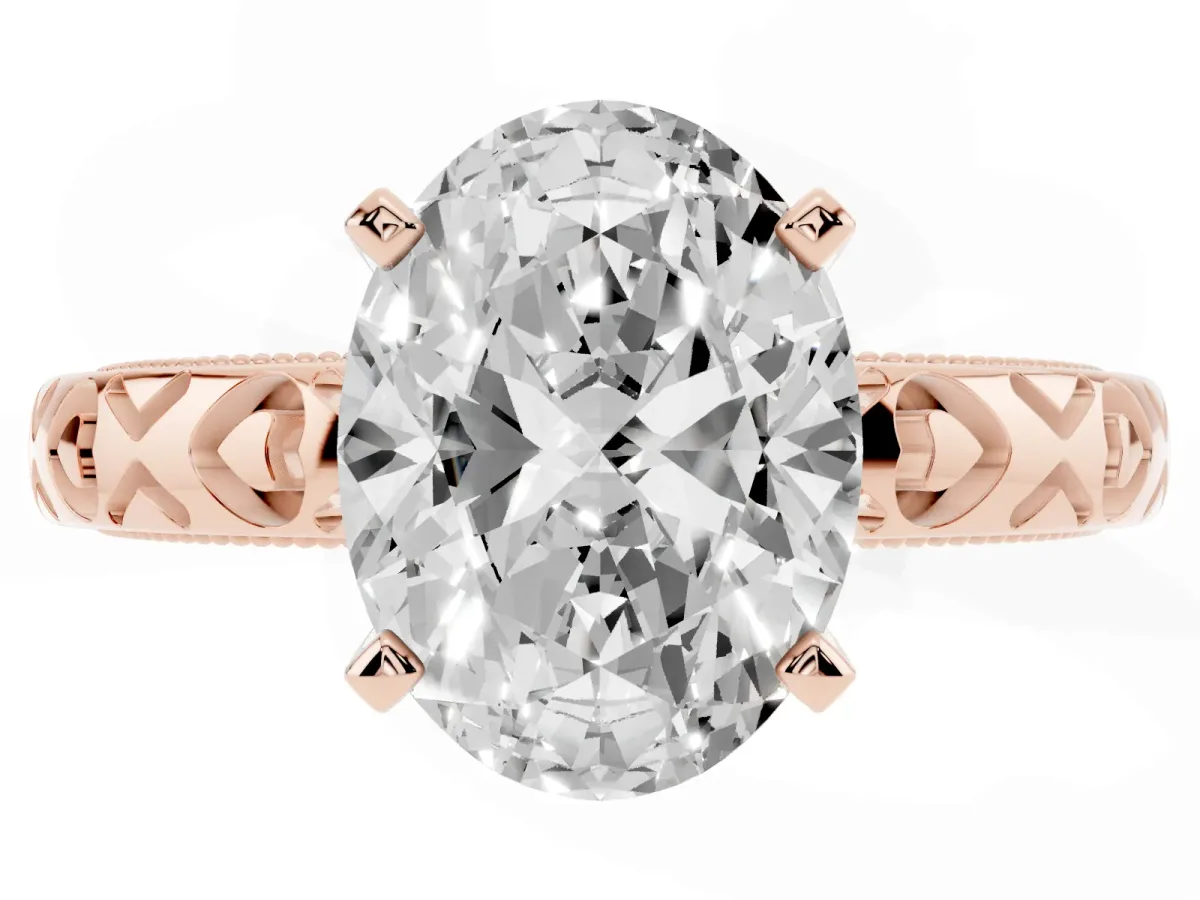 Oval Cut Solitaire Diamond Engagement Ring with XO Engraved Band and Four-Prong Setting Rose gold
