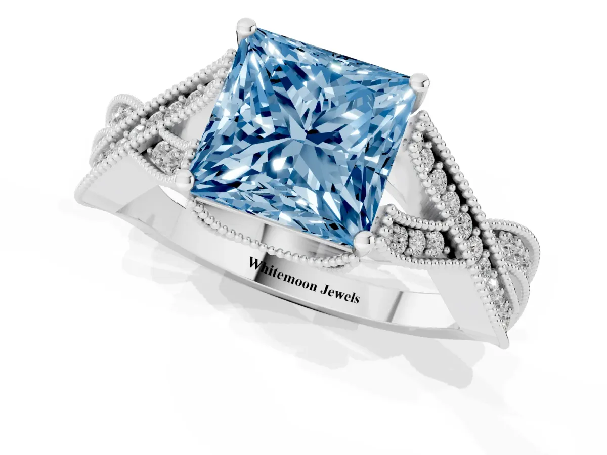 Fancy Blue Princess Cut Cut Diamond Twisted Band with Milgrain Pave Setting and Four-Prong Setting Platinum