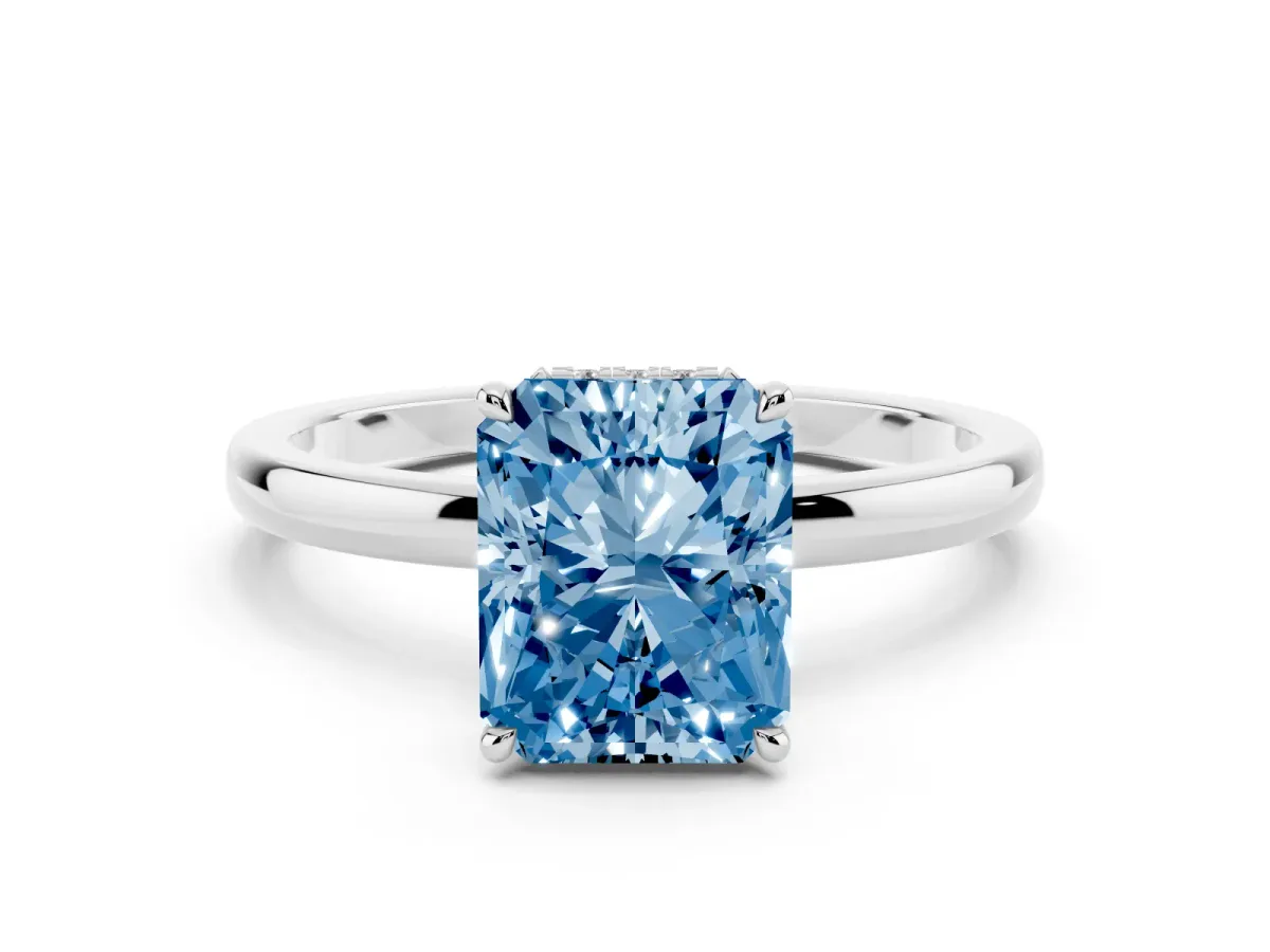 Fancy Blue Radiant Cut Solitaire Engagement Ring with Cathedral Band and Four-Prong Setting Silver
