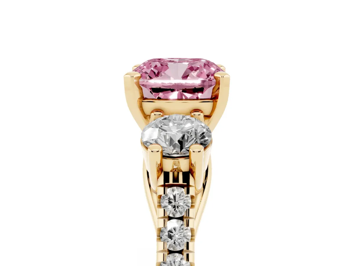 Fancy Pink Three-Stone Cushion Cut Diamond Pavé Band with Four-Prong Setting Yellow gold