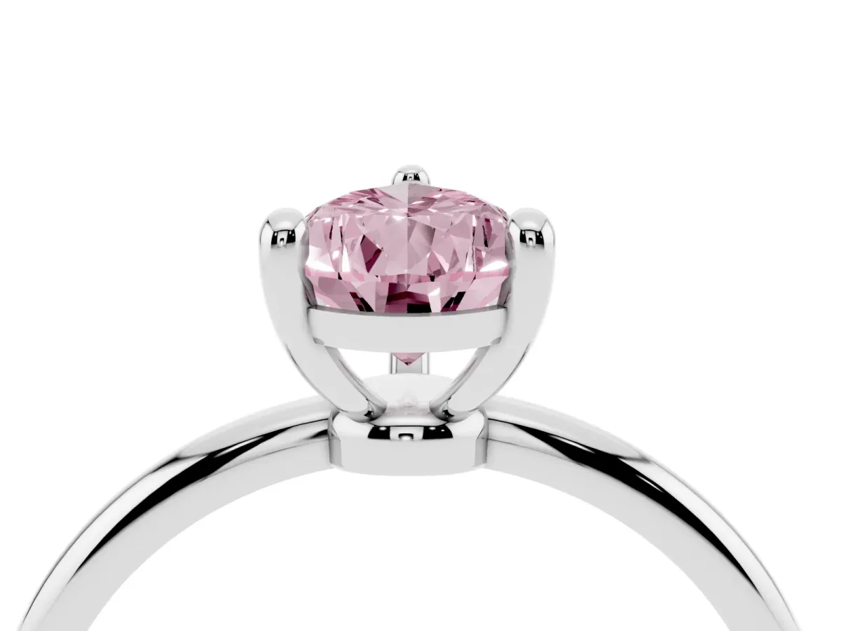 Fancy Pink Pear Cut Solitaire Diamond Ring with 4-Prong Setting on a Classic Band Silver