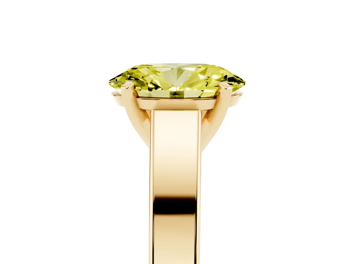 Fancy Yellow Oval Cut Solitaire Engagement Ring with Four-Prong Setting and Tapered Band Yellow gold
