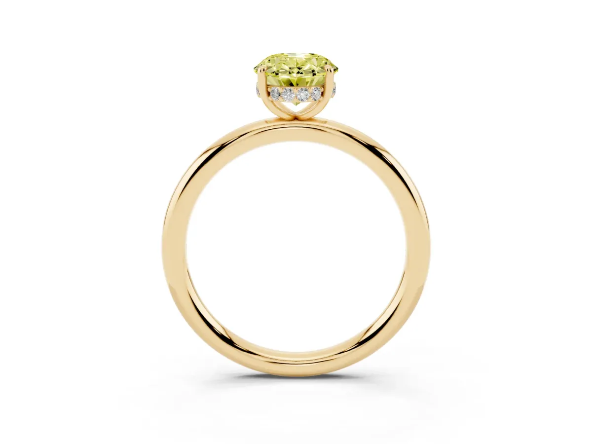 Fancy Yellow Oval Cut Diamond Solitaire Ring with Thin Band and Four-Prong Setting Yellow gold