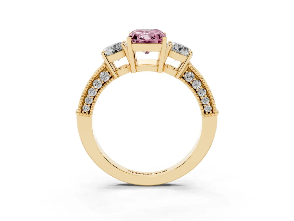 Fancy Pink Radiant Cut Three-Stone Diamond Ring with Pavé Band and Four-Prong Setting Yellow gold