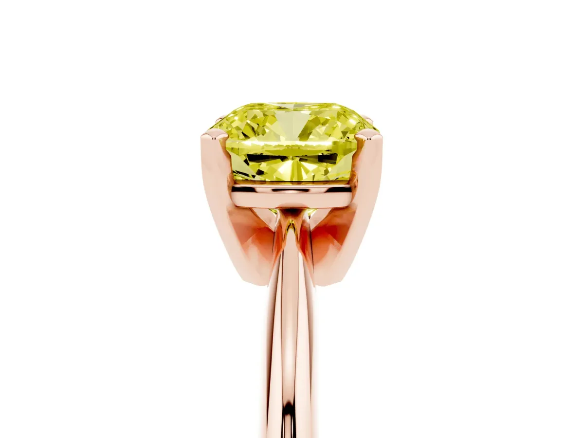 Fancy Yellow Cushion Cut Cut Solitaire Ring with Four-Prong Setting on a Classic Band Rose gold