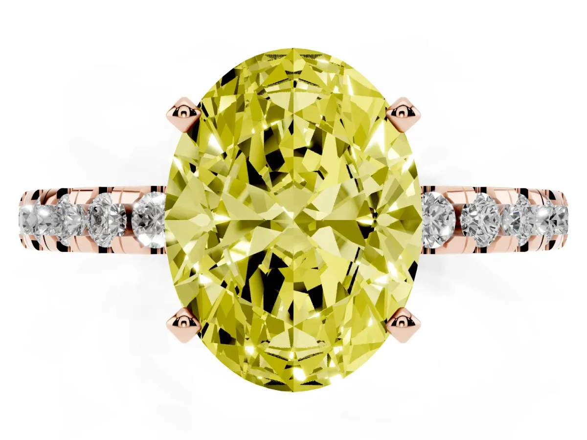 Fancy Yellow Oval Cut Diamond Solitaire Ring with Round Pavé Band and Four-Prong Setting Rose gold