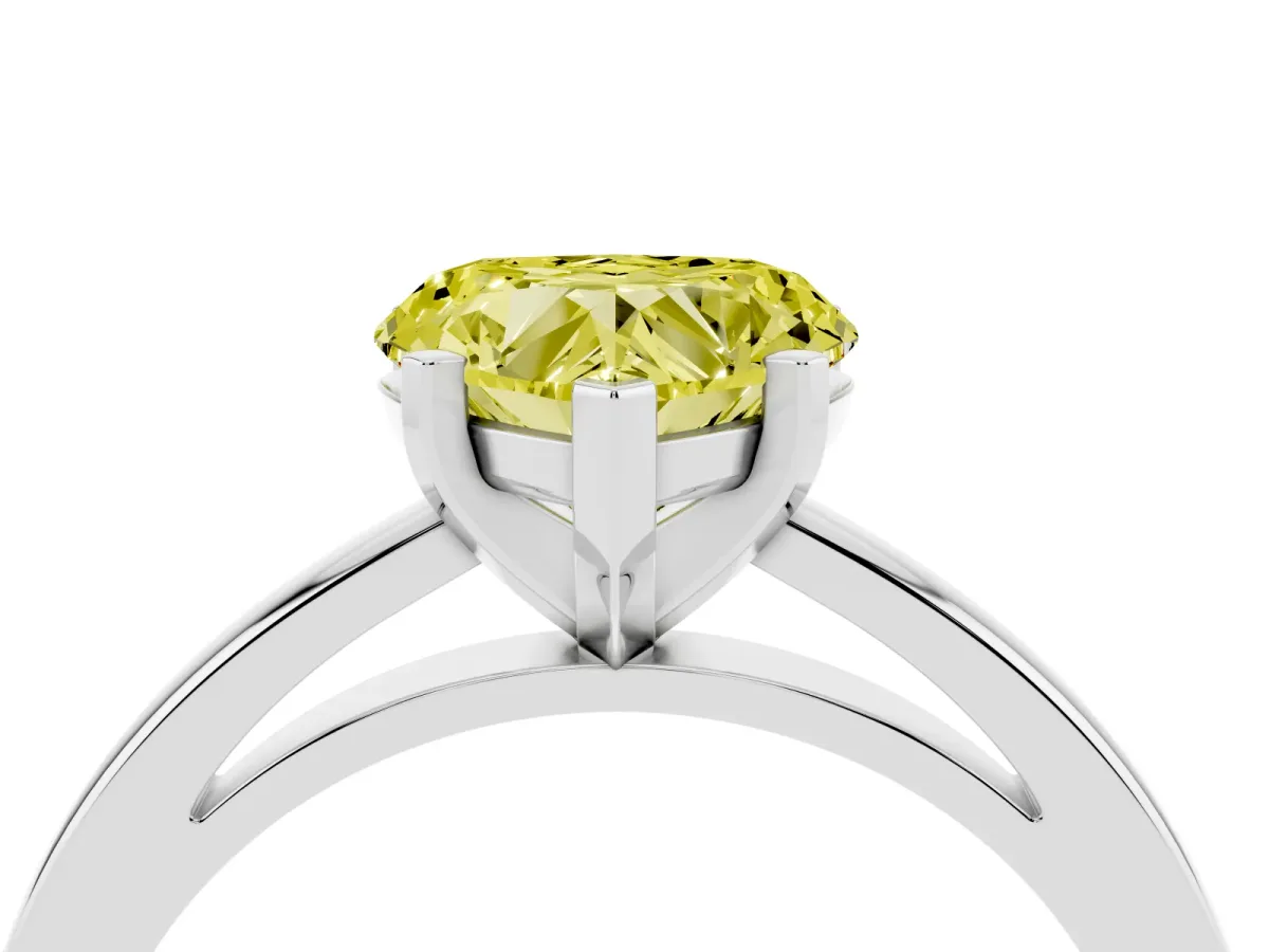 Fancy Yellow Heart Cut Solitaire Diamond Engagement Ring with Four-Prong Setting on a Classic Band Platinum