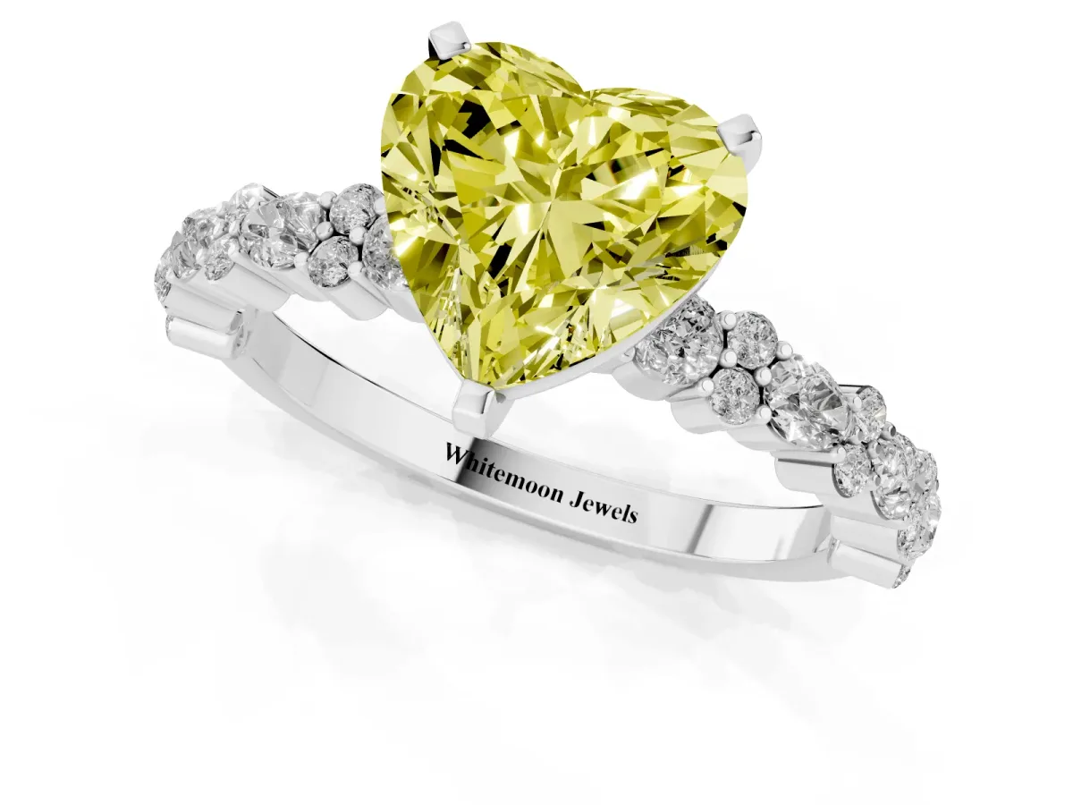 Fancy Yellow Heart Cut Diamond Side Stone Solitaire Ring with Round and Four-Prong Setting Silver