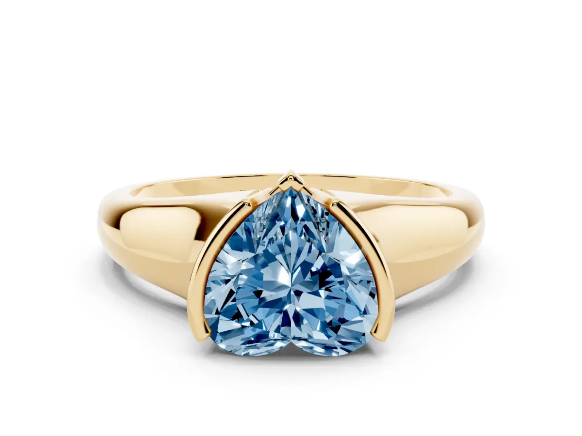 Fancy Blue Heart Cut Solitaire Tension Set Diamond Ring with Split Shank Band Yellow gold