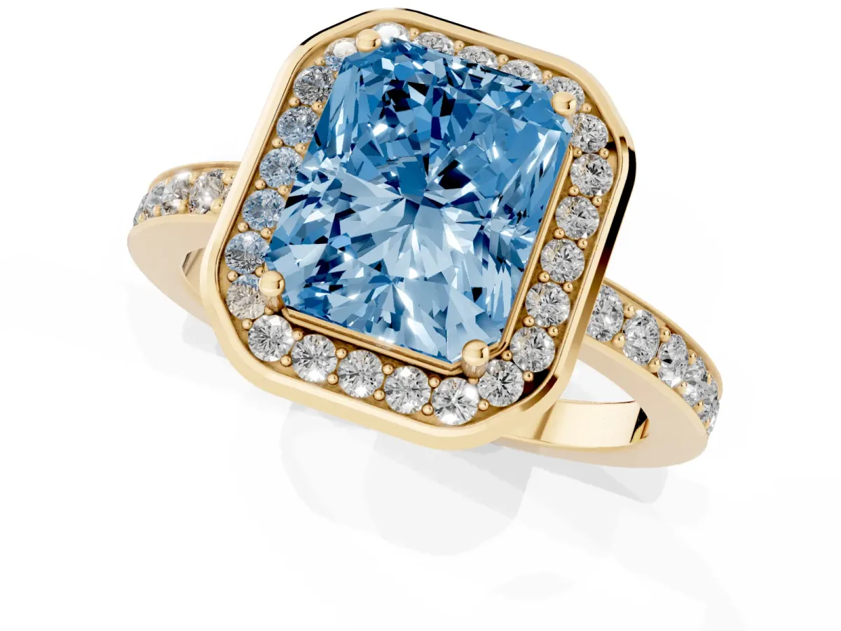 Fancy Blue Radiant Cut Diamond Halo Ring with Bezel Frame and Pavé Band Yellow gold