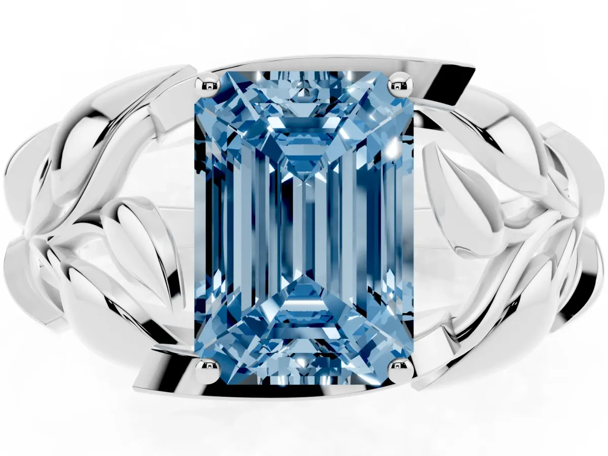 Fancy Blue Emerald Cut Diamond Leaf-Inspired Engagement Ring with Round Accents and Prong Setting Silver