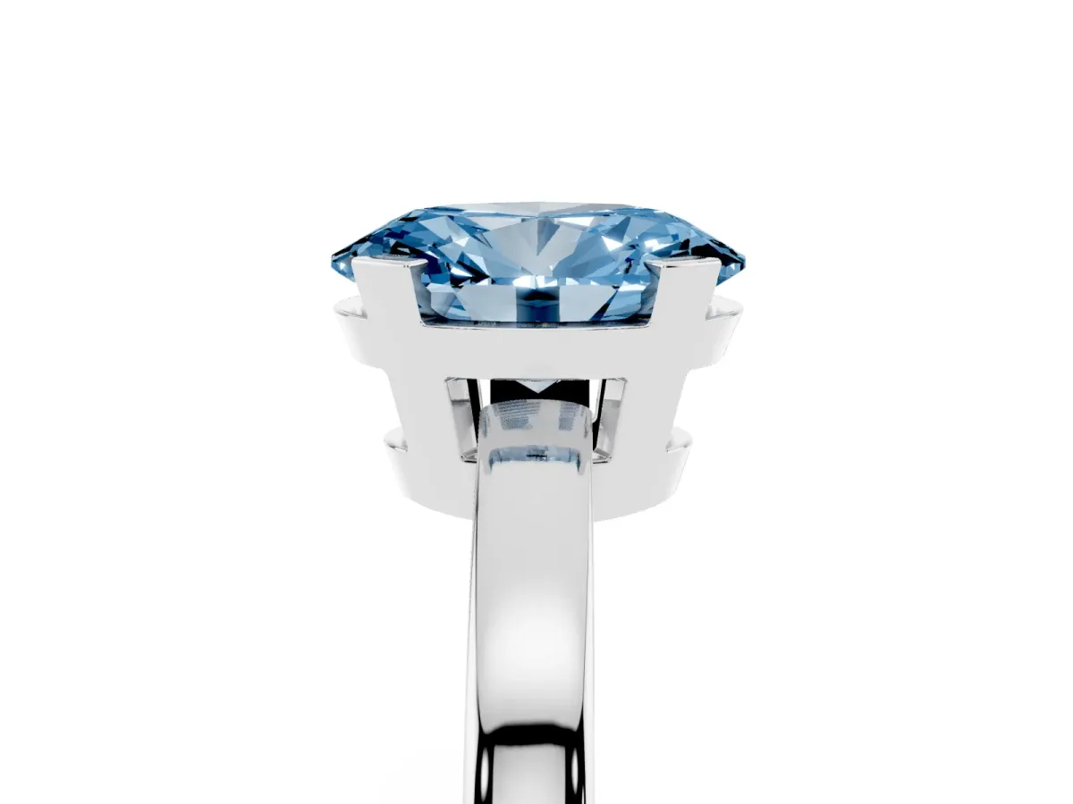 Fancy Blue Oval Cut Cut Solitaire Ring with Four-Prong Setting and Classic Band Silver