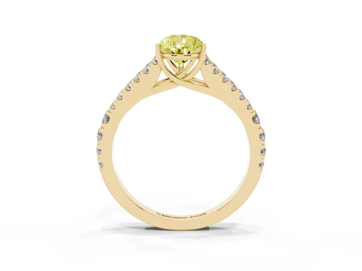 Fancy Yellow Pear Cut Diamond Split Shank Engagement Ring with Round Pavé and Prong Setting Yellow gold
