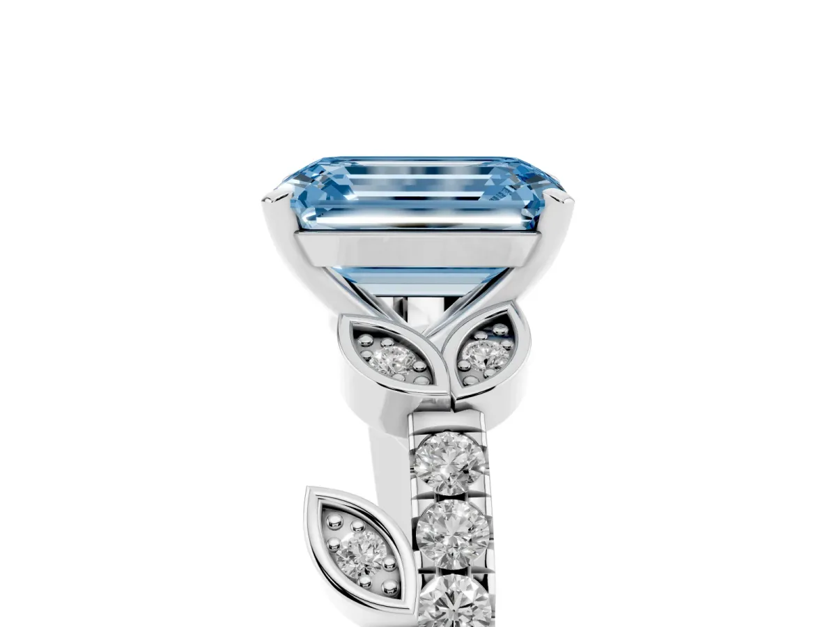 Fancy Blue Emerald Cut Solitaire Leaf-Inspired Diamond Ring with Pavé Band and Four-Prong Setting Silver