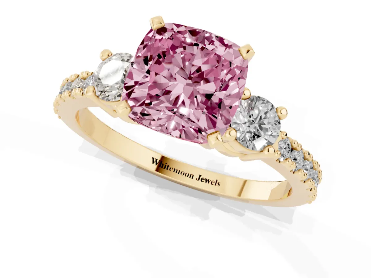 Fancy Pink Cushion Cut Three-Stone Diamond Pavé Band with Prong Setting Yellow gold