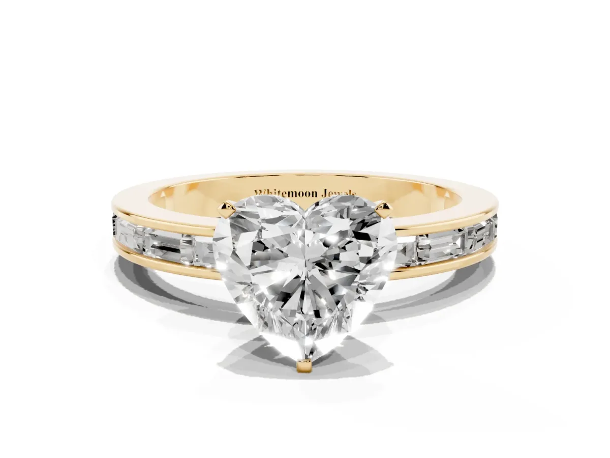 Heart Cut Solitaire Diamond Ring with Channel-Set Baguette Band and Four-Prong Setting Yellow gold