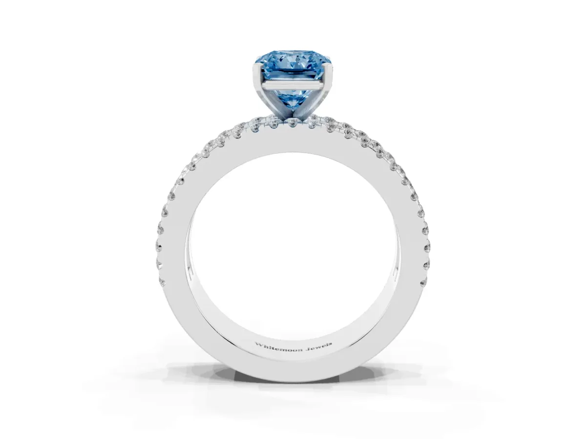 Fancy Blue Radiant Cut Diamond Solitaire Ring with Pavé and Channel Set Band Silver