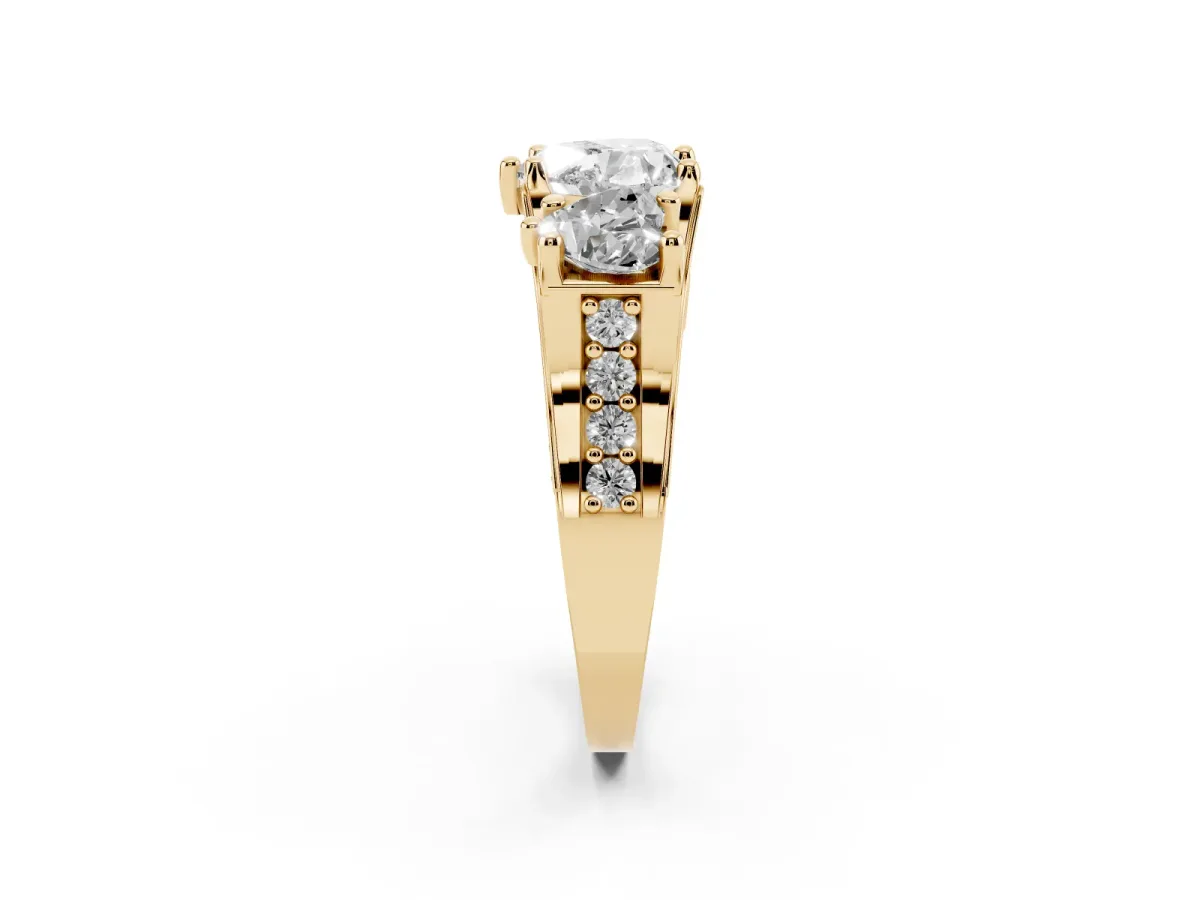 Heart Cut Diamond Three-Stone Ring with Channel Set Band and Four-Prong Setting Yellow gold
