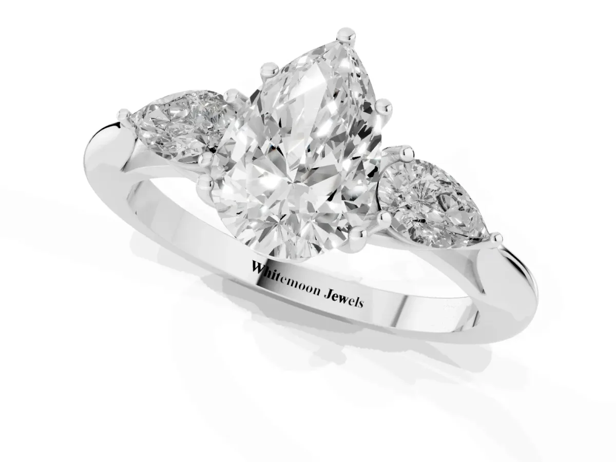 Pear Cut Diamond Three-Stone Ring with Pear Side Stones and Prong Setting Silver