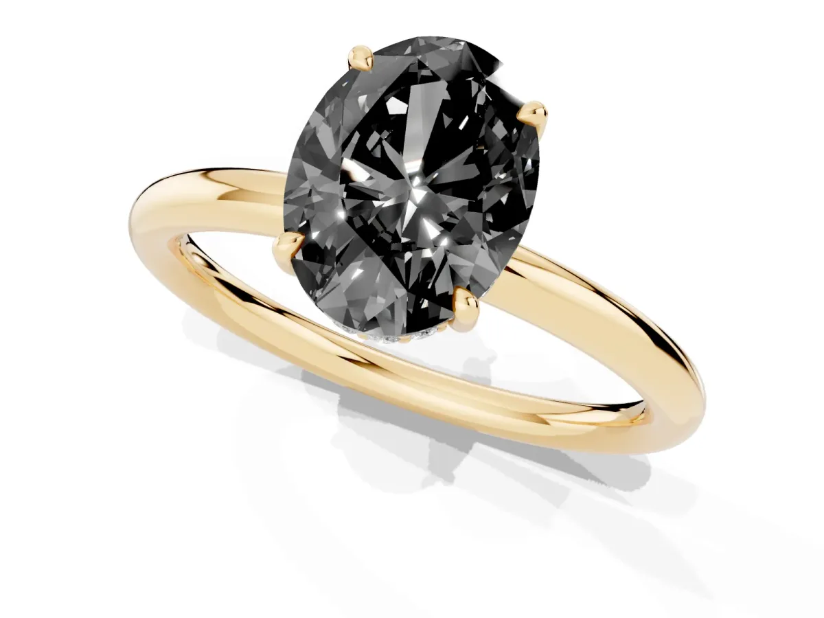 Fancy Black Oval Cut Diamond Solitaire Ring with Thin Band and Four-Prong Setting Yellow gold