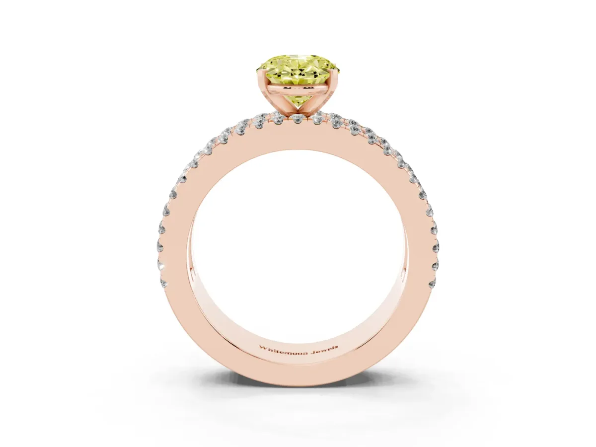 Fancy Yellow Oval Cut Diamond Solitaire Ring with Pavé and Channel Set Band Rose gold