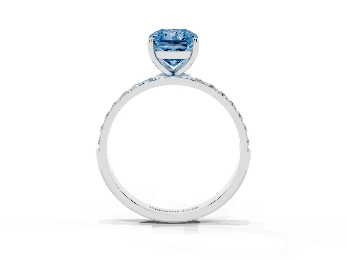 Fancy Blue Radiant Cut Diamond Solitaire Ring with Round Pavé Shoulders and Prong Setting Silver