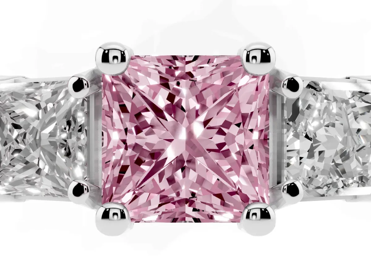 Fancy Pink Princess Cut Diamond Three-Stone Ring with Channel Set Band and Four-Prong Setting Silver