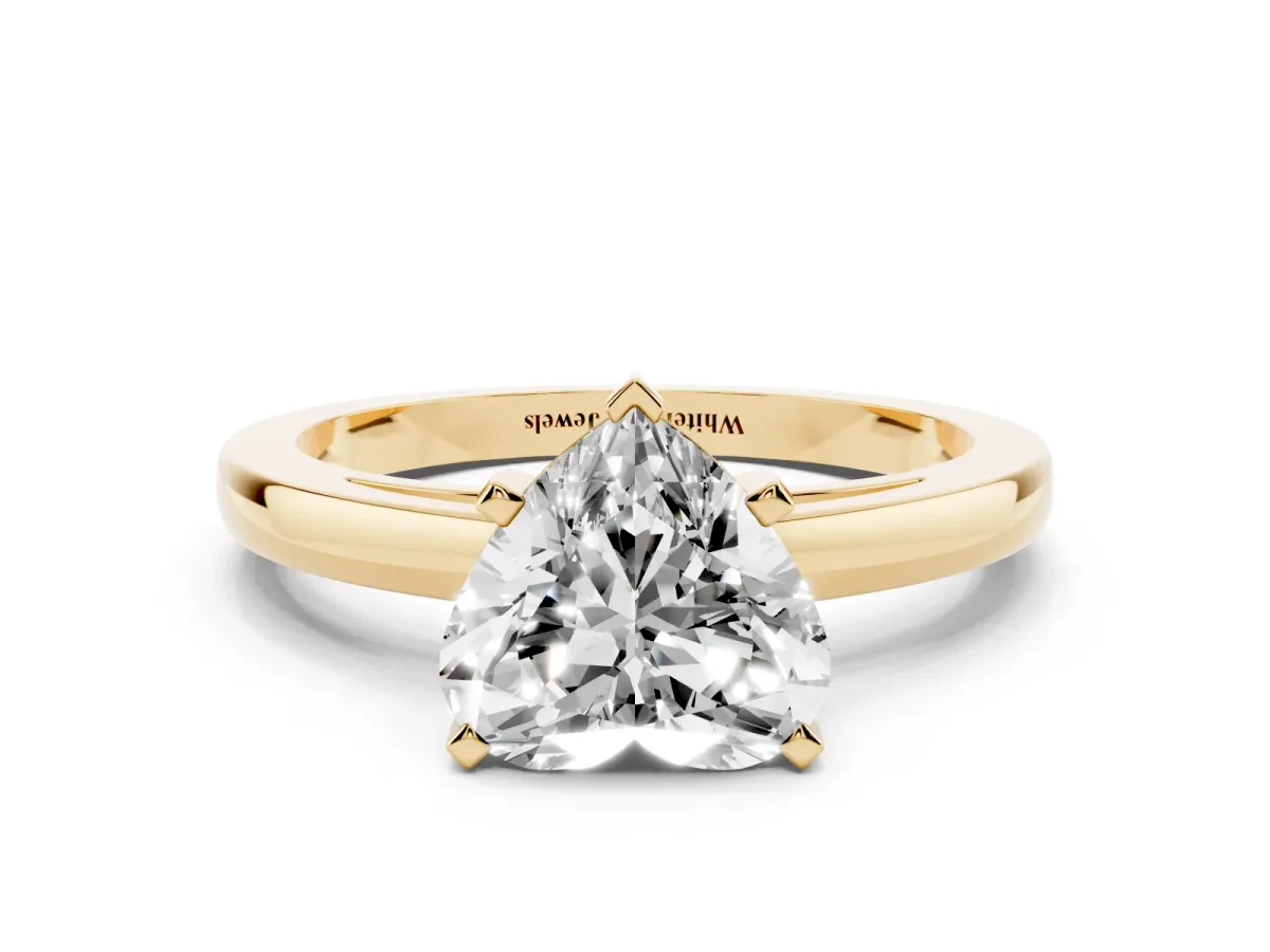 Heart Cut Solitaire Diamond Engagement Ring with Four-Prong Setting on a Classic Band Yellow gold