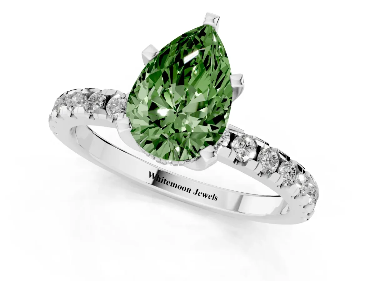 Fancy Green Pear Cut Diamond Solitaire Ring with Round Pavé Band and Four-Prong Setting Silver