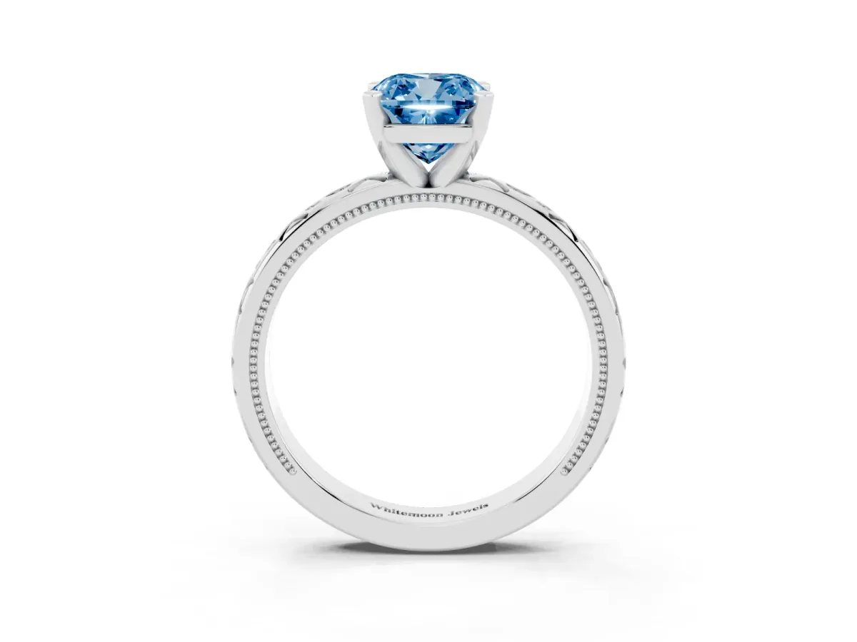 Fancy Blue Cushion Cut Solitaire Engagement Ring with Scrollwork Band and Four-Prong Setting Silver