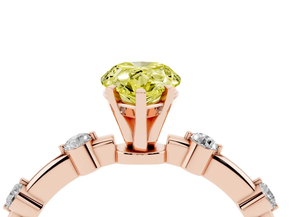 Fancy Yellow Pear Cut Solitaire Diamond Ring with Bezel Set Side Stones and Prong Setting Rose gold