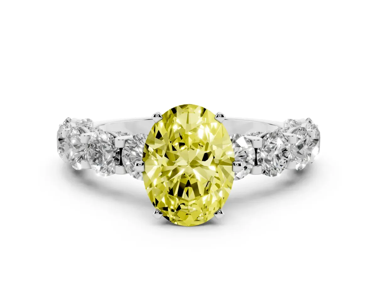 Fancy Yellow Oval Cut Diamond Side Stone Engagement Ring with Four-Prong Setting Platinum